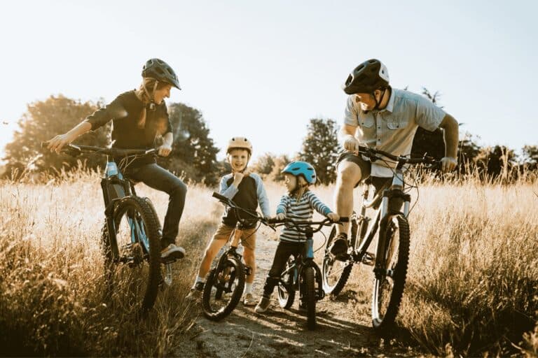 Family cycling in the countryside